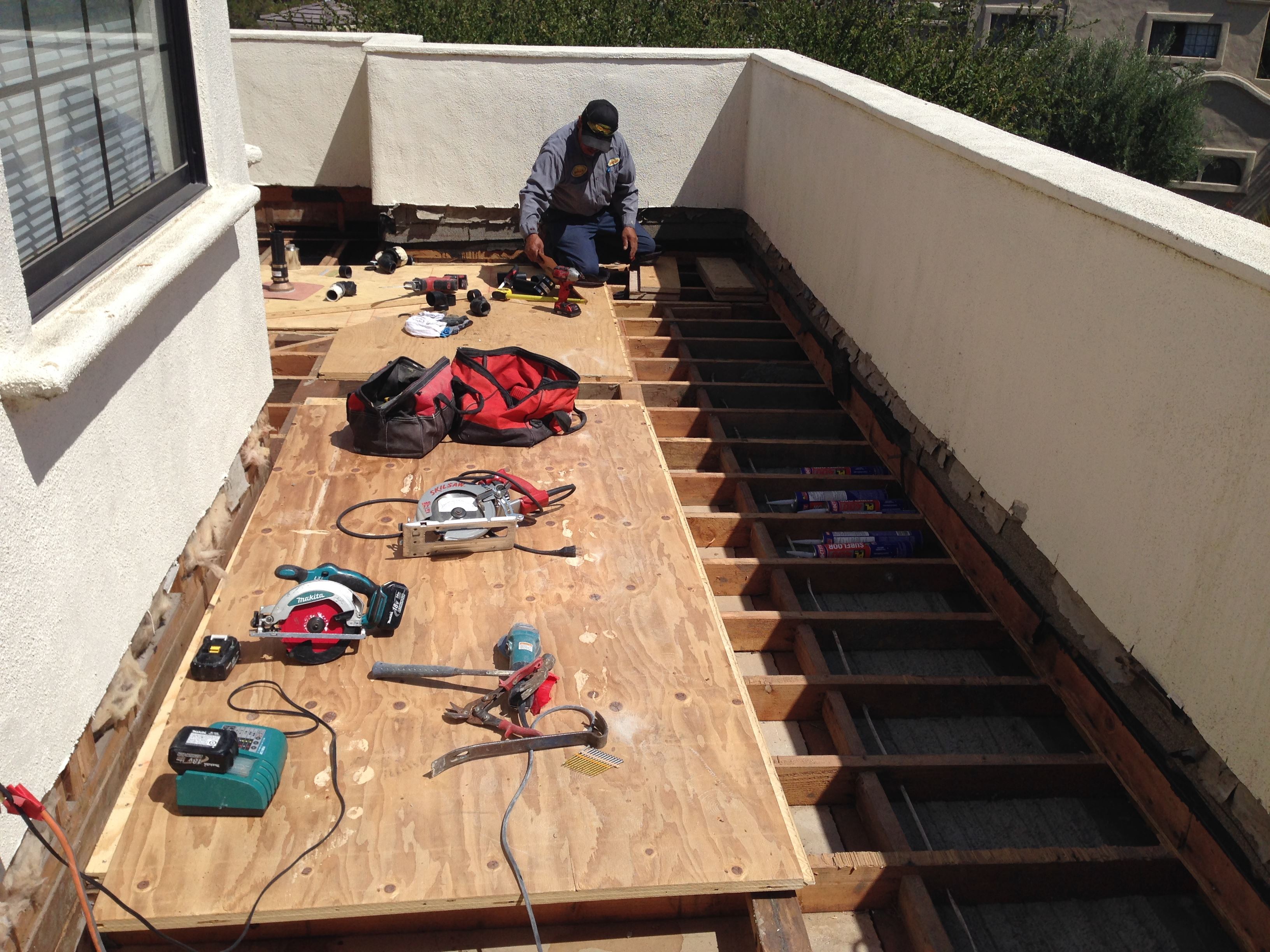 Residential Deck Leak Repairs Before & After Deck Resurfacing in