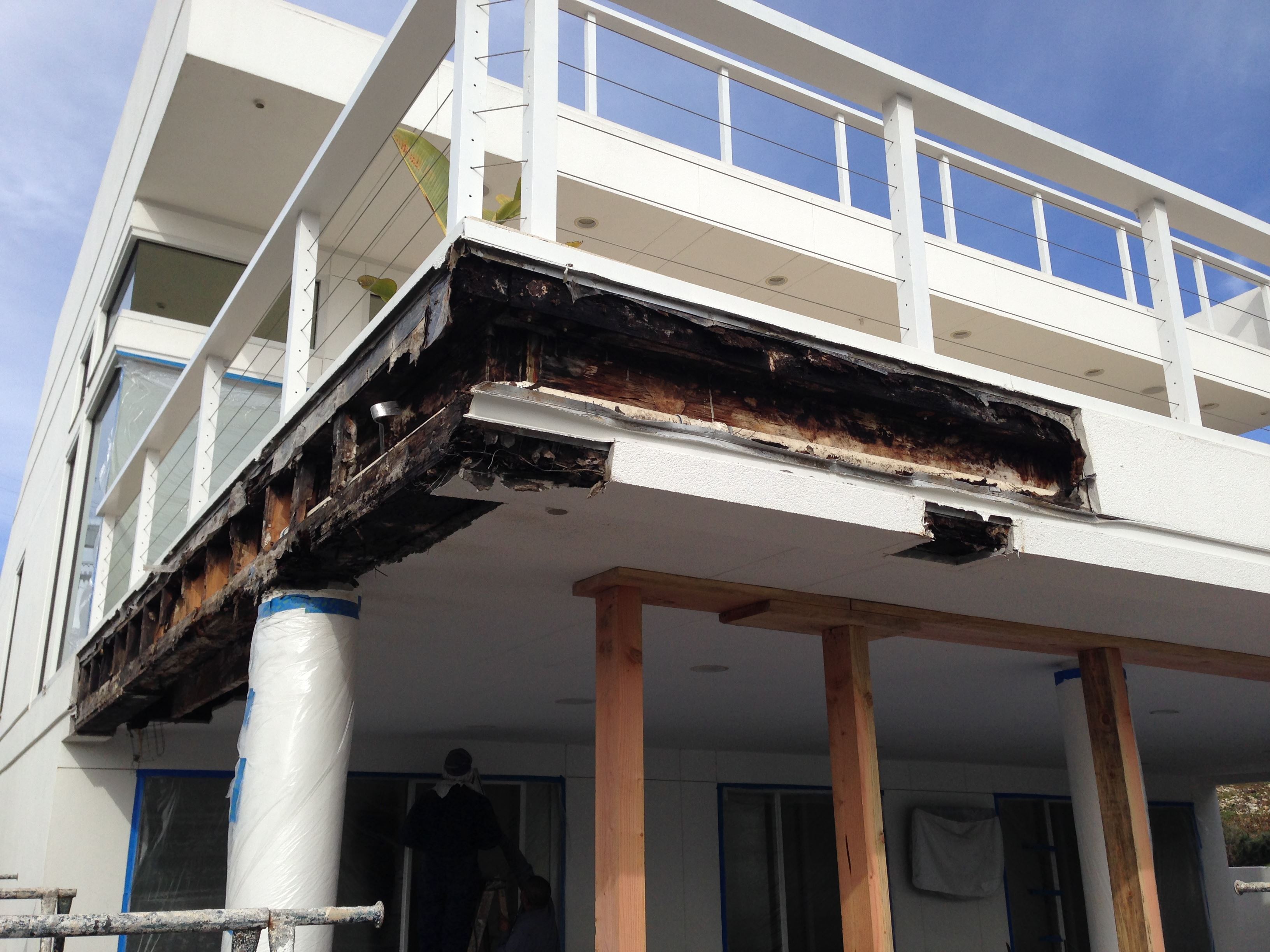 Residential Deck Leak Repairs Before & After Deck Resurfacing in